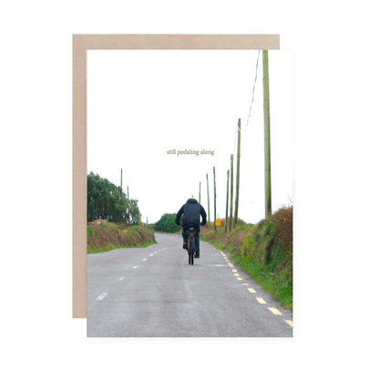 still pedalling along Irish Roads Greeting Cards